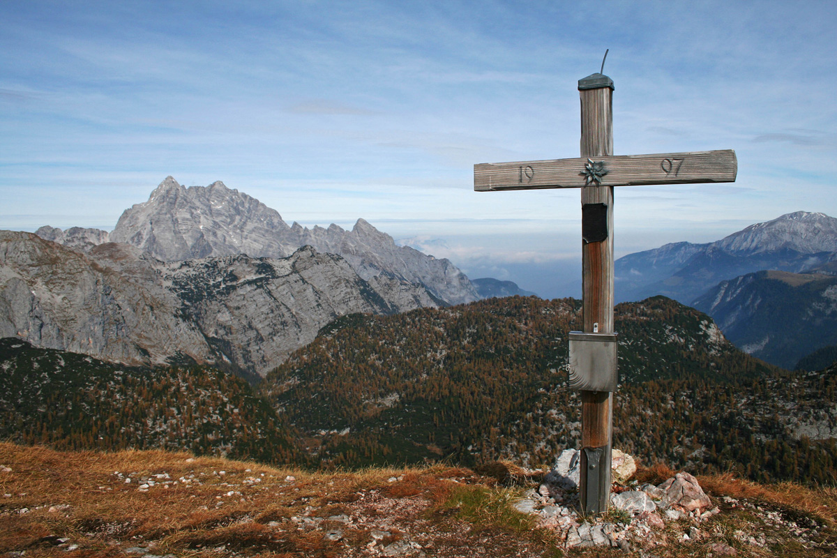 Summit cross in front of the Watzmann